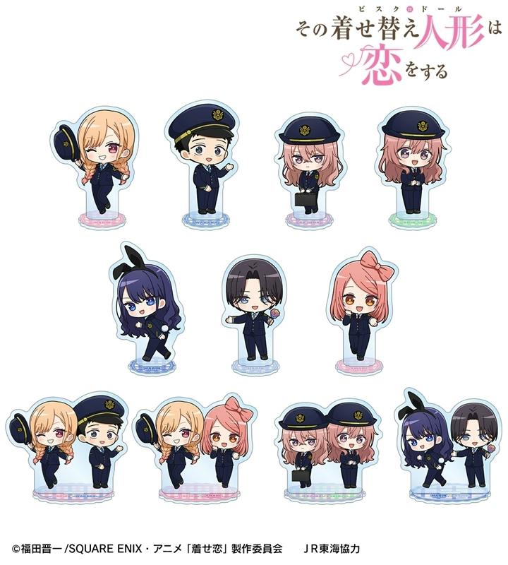 Group of chibi acrylic decorative stands showing characters in station staff uniforms, each displayed with a round base.