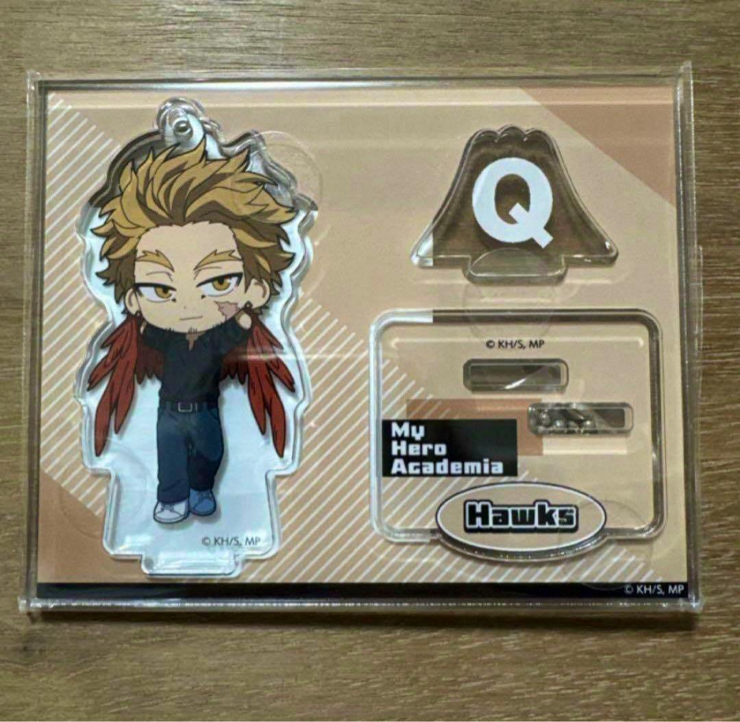 Packaged My Hero Academia Hawks acrylic stand set showing the clear acrylic character figure and separate base pieces inside the blister pack.