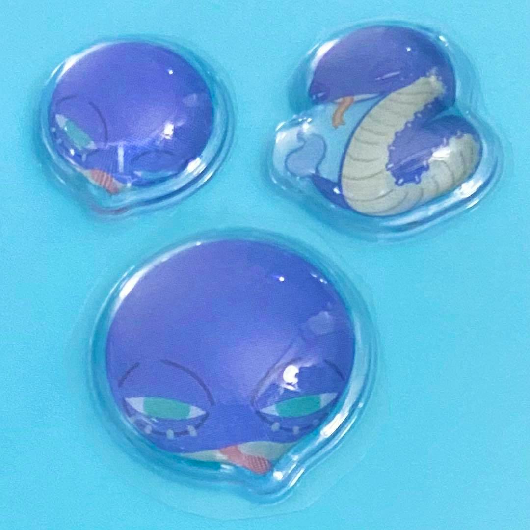Close-up photo of three blue puffy stickers from the My Hero Academia (Dabi) animal sticker set on a light blue backing.