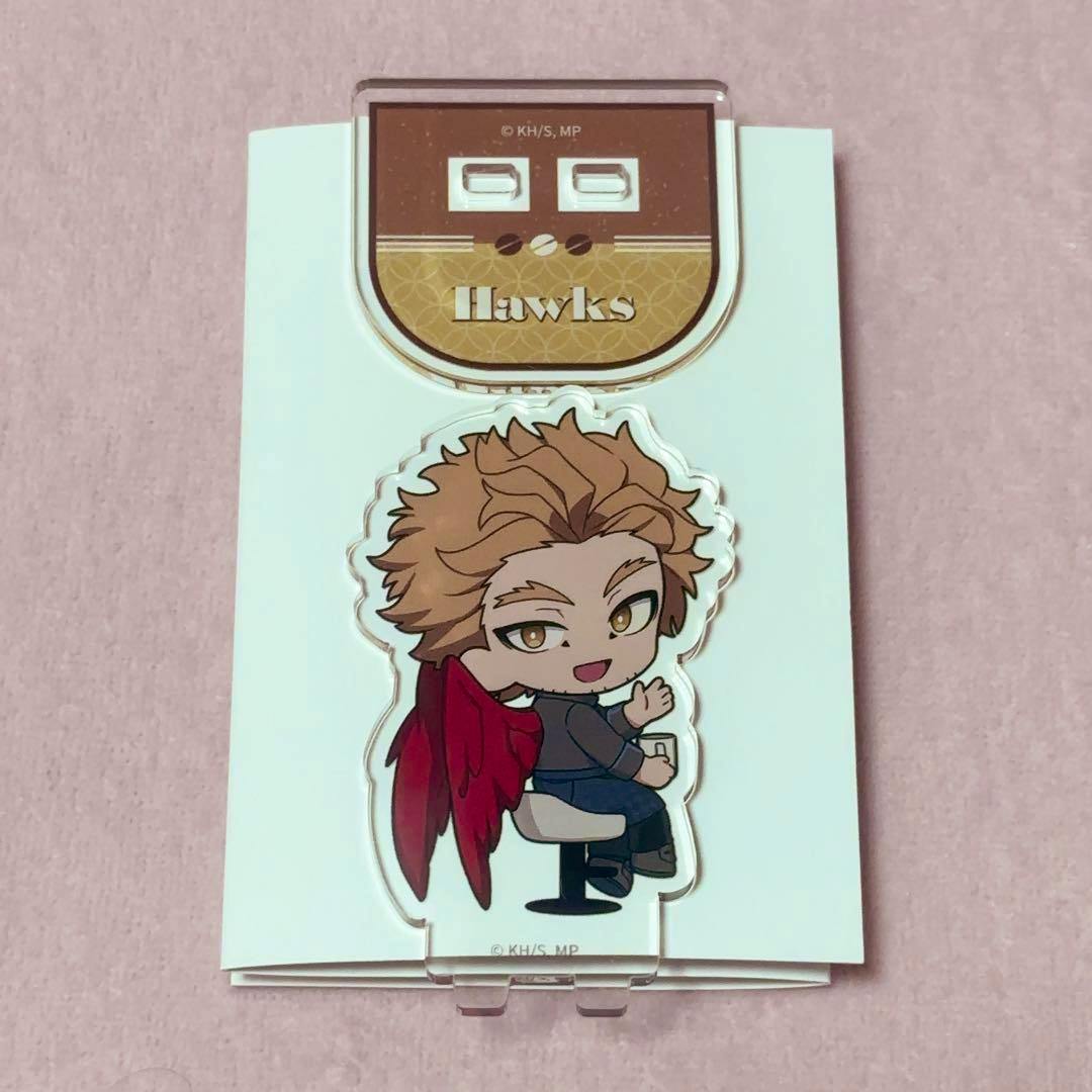 Photo of a mini acrylic decorative stand featuring a chibi Hawks character attached to its white backing card labeled "Hawks".