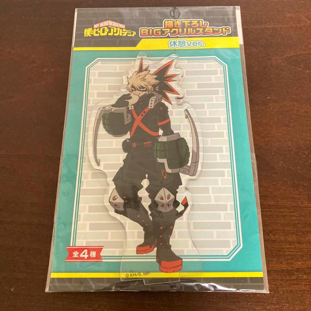Front view of the packaged My Hero Academia Bakugo acrylic stand on a wooden surface.
