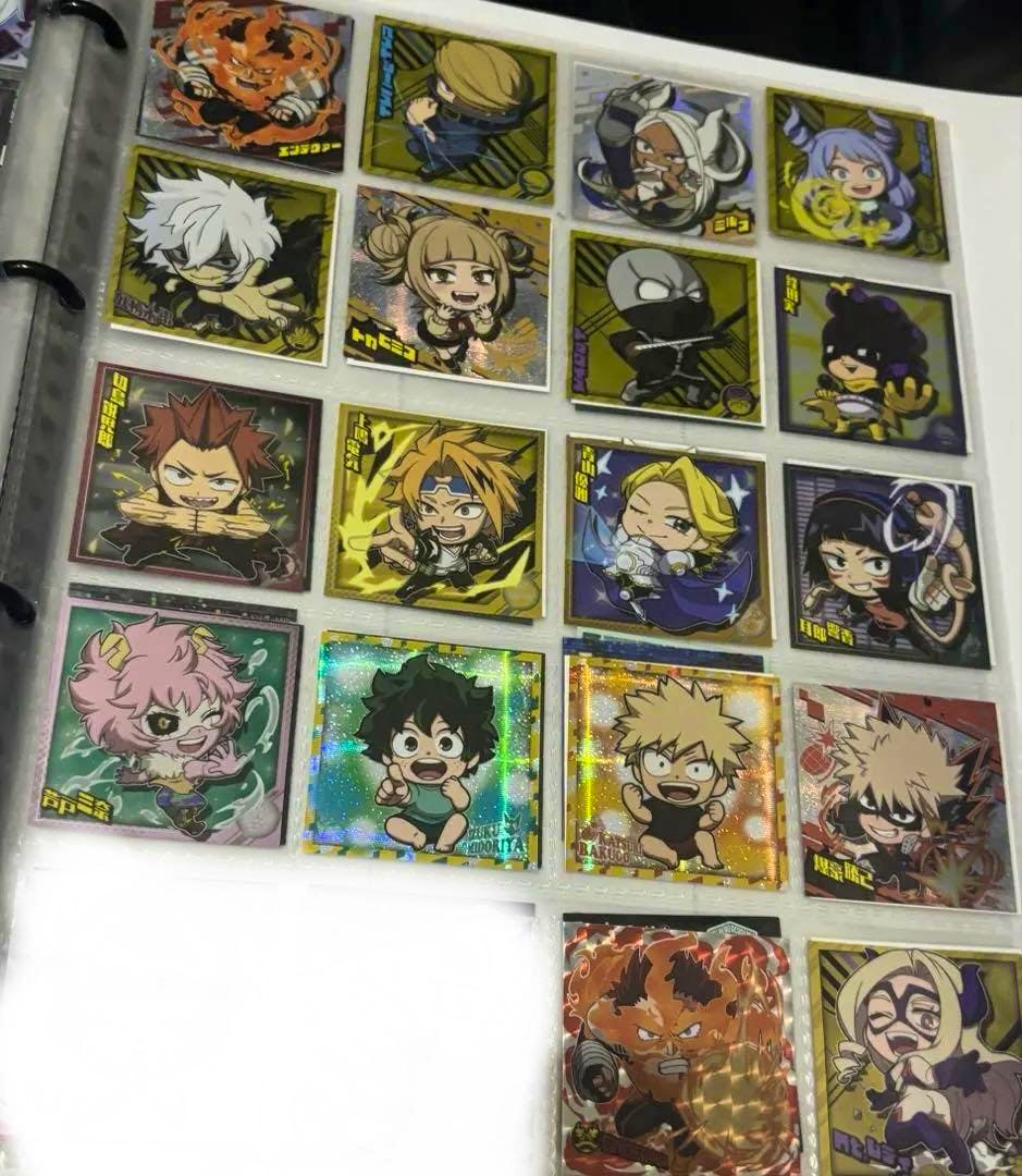 Binder page showing multiple My Hero Academia chibi wafer stickers from the sticker bulk set.