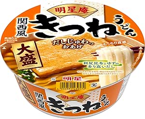 Packaged Myoso-an Kitsune Udon instant noodle cup showing the lid artwork and product branding.