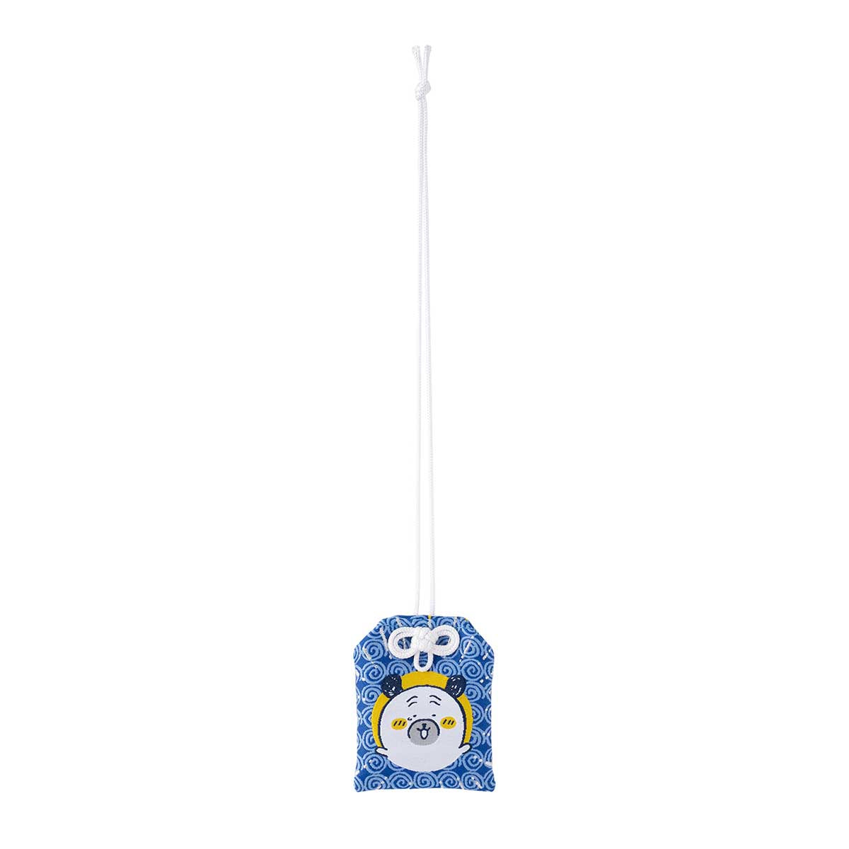 Blue cloth amulet charm showing a cartoon pug face with a white hanging cord.