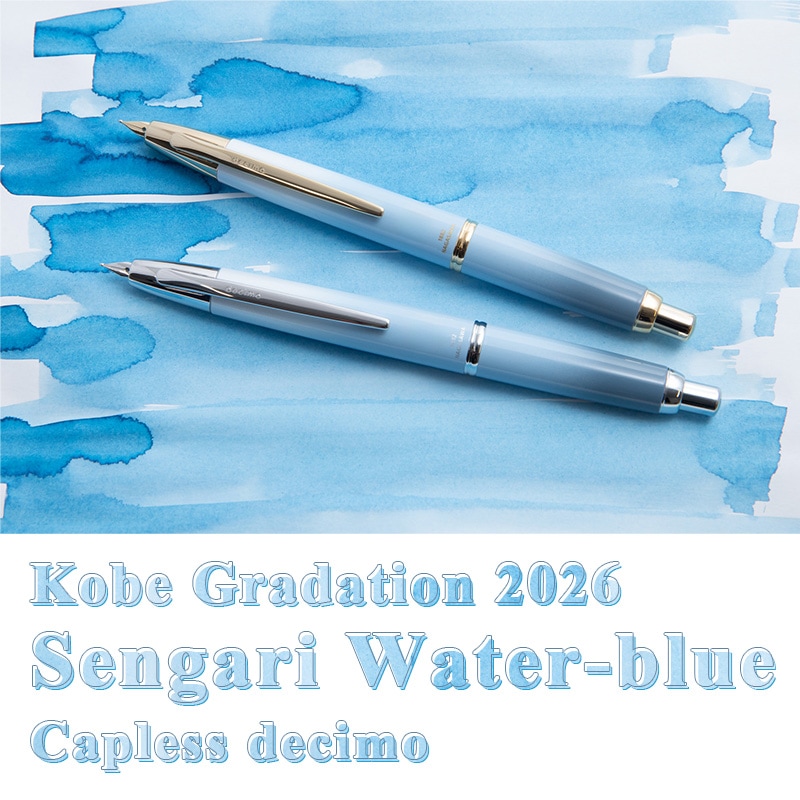 Two NAGASAWA Kobe Gradation Sengari Water-blue capless decimo fountain pens, one with gold trim and one with silver trim, shown on a blue watercolor background.