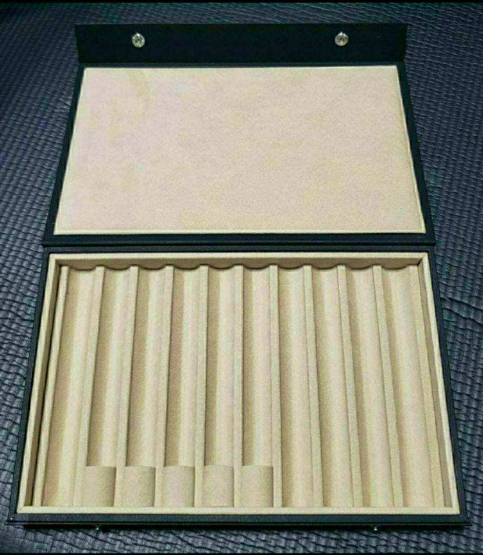 Open Namiki pen case showing ten padded cylindrical pen slots and the inner lid.