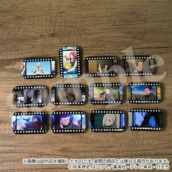 Twelve Naruto Shippuden square badge designs laid out on a wooden surface.