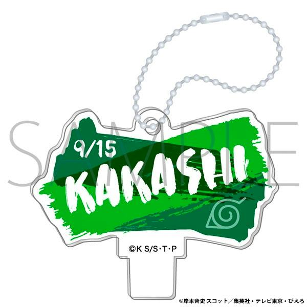 Acrylic keychain charm showing a green brushstroke design reading "KAKASHI" with a small Konoha symbol and an attached beaded chain.