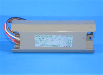NEC 52W fluorescent lamp ballast (FBD-521L-W1) with attached wires on a blue background.