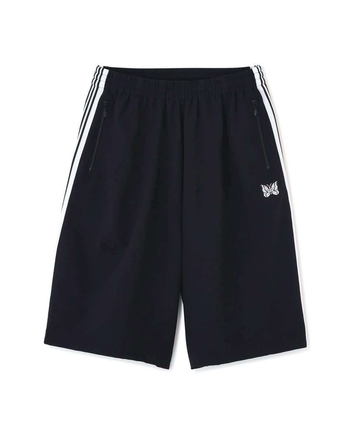 Front view of black Needles "Exclusive H.D Track Shorts - Seersucker" with white side stripes, zip pockets, and a butterfly logo on the right leg against a white background.