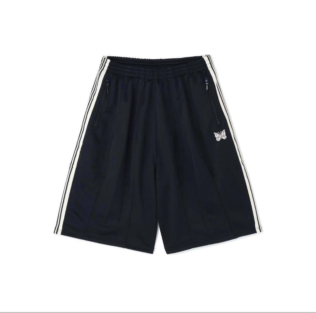 Flat-lay of black men's polyester shorts with white side stripes and a small butterfly logo.