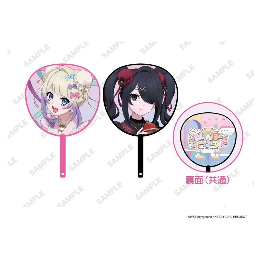 A product image showing three BIG paper uchiwa fans for the anime "NEEDY GIRL OVERDOSE"—two character-front designs and one back-design.