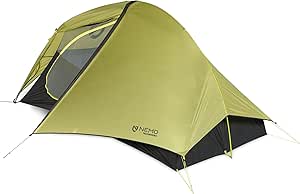 Green Nemo Hornet Osmo 2P tent set up with its rainfly in place and a partially open vestibule visible.