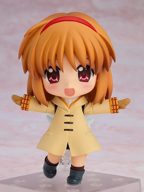 Front view of the Nendoroid 月宮あゆ figure wearing a yellow coat with arms outstretched on a clear display base.