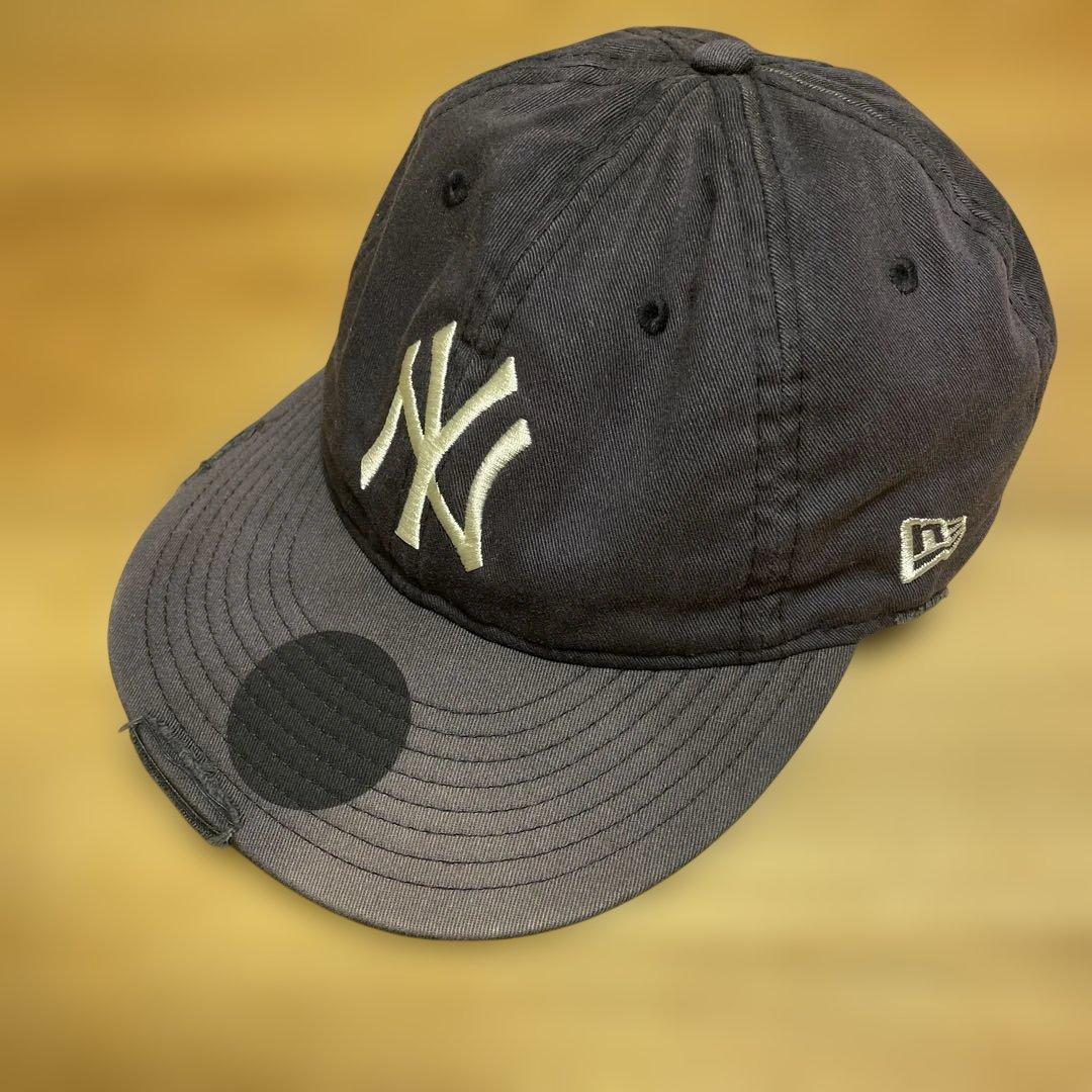 A NewEra 9THIRTY Yankees cotton cap showing the embroidered NY front logo, curved brim, and New Era flag on the side on a plain background.