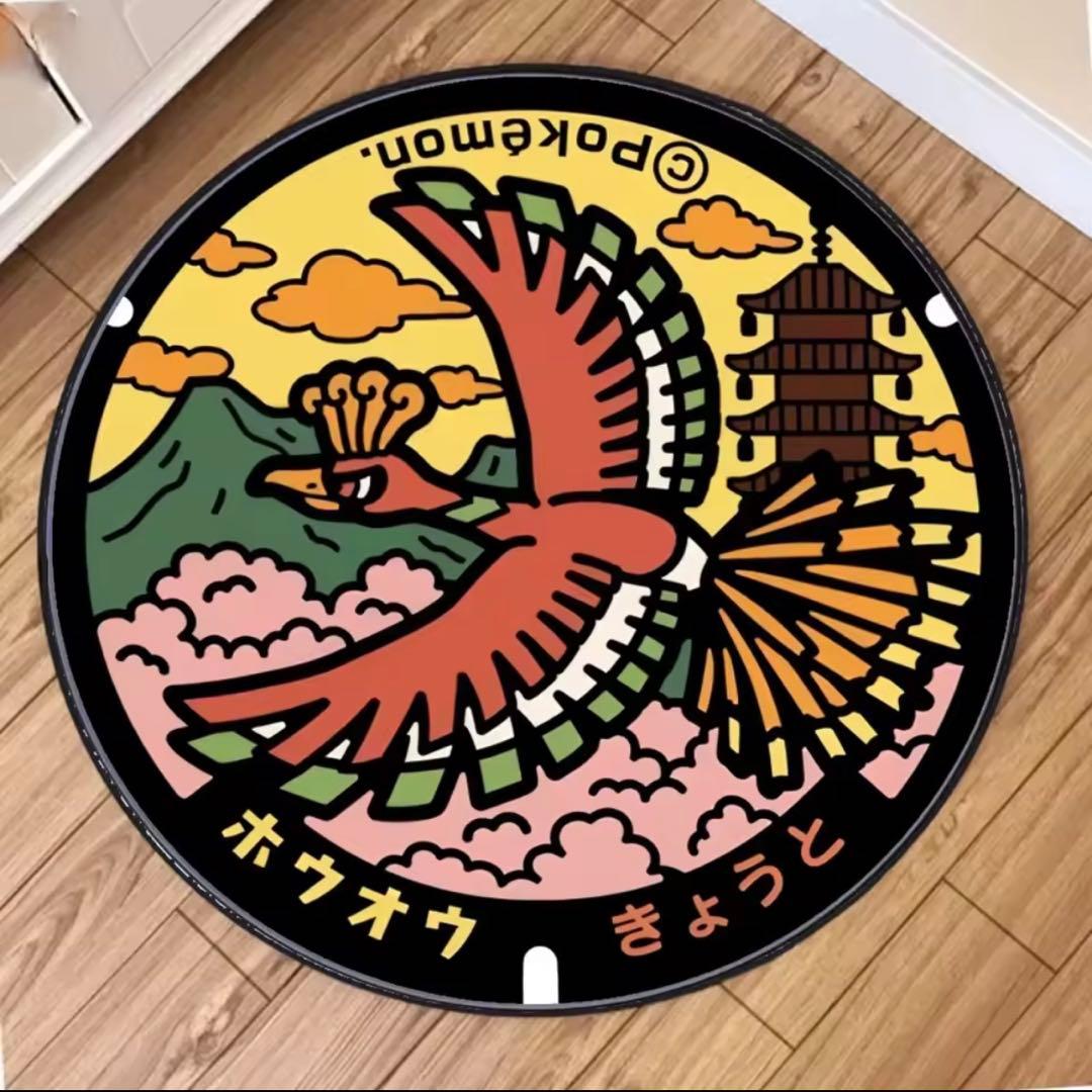 Round carpet rug featuring the Pokémon Ho‑Oh design placed on a wooden floor.