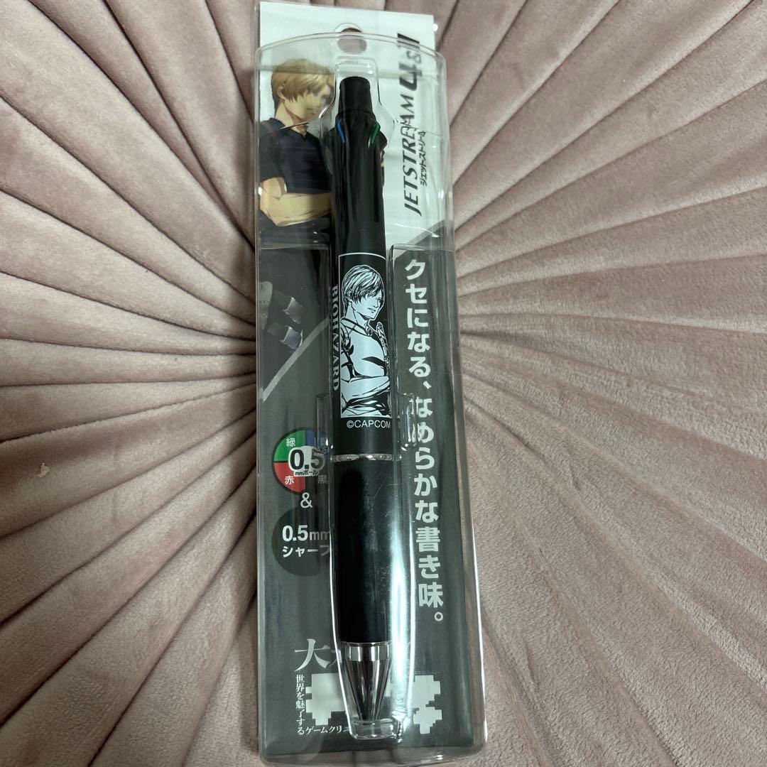 Front view of the packaged Jetstream ballpoint pen with Resident Evil (Leon) artwork visible through the blister pack.