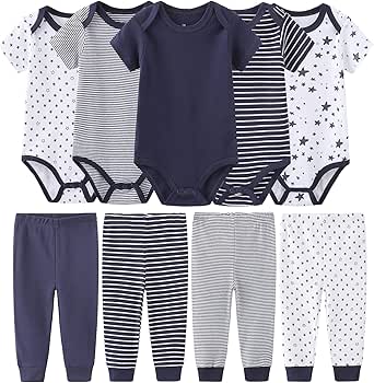 Five newborn short-sleeve bodysuits and five matching infant pants in navy, striped, and star prints laid out on a white background.