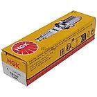 A yellow retail box showing a spark plug and an image of the plug on the packaging.