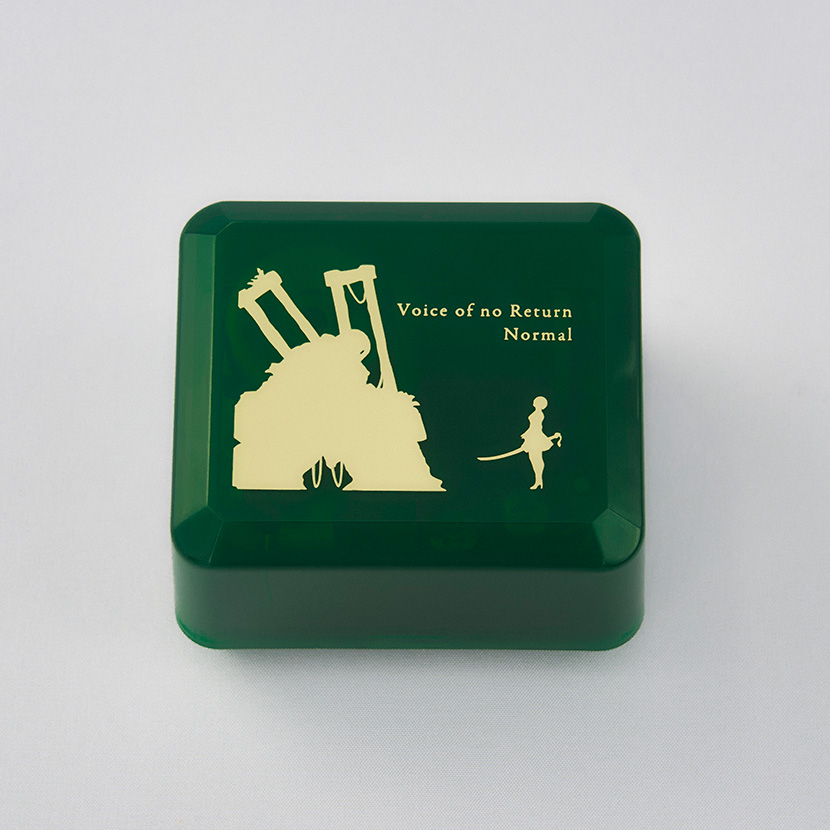 Green rectangular music box with a gold silhouette design and the text "Voice of no Return Normal" on the lid.