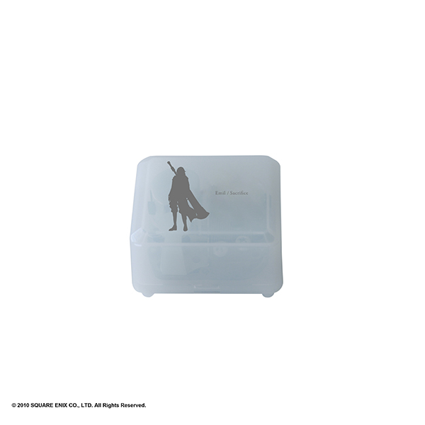 White translucent NieR music box featuring a black silhouette of Emil and printed text on the lid.