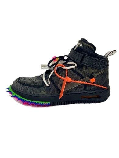 Side view of a black AIR FORCE 1 MID SP shoe showing white laces, an orange zip tie, and a bright multicolored jagged sole.