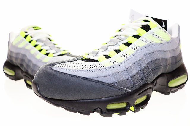 Pair of Nike Air Max 95 OG Neon Yellow sneakers in gray and neon yellow on a white background.