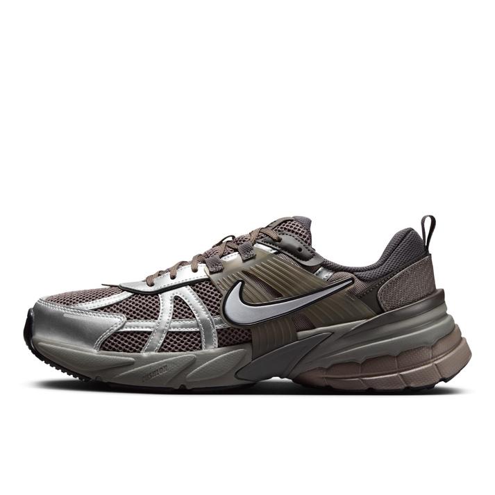 Side view of the V2K Run 200CVSTON/M SIL sports shoe showing a brown-grey mesh upper with silver overlays and a Nike Swoosh.