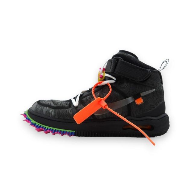 Side view of an OFF-WHITE 2022 Nike Air Force 1 Mid sneaker in black with an orange zip tie.