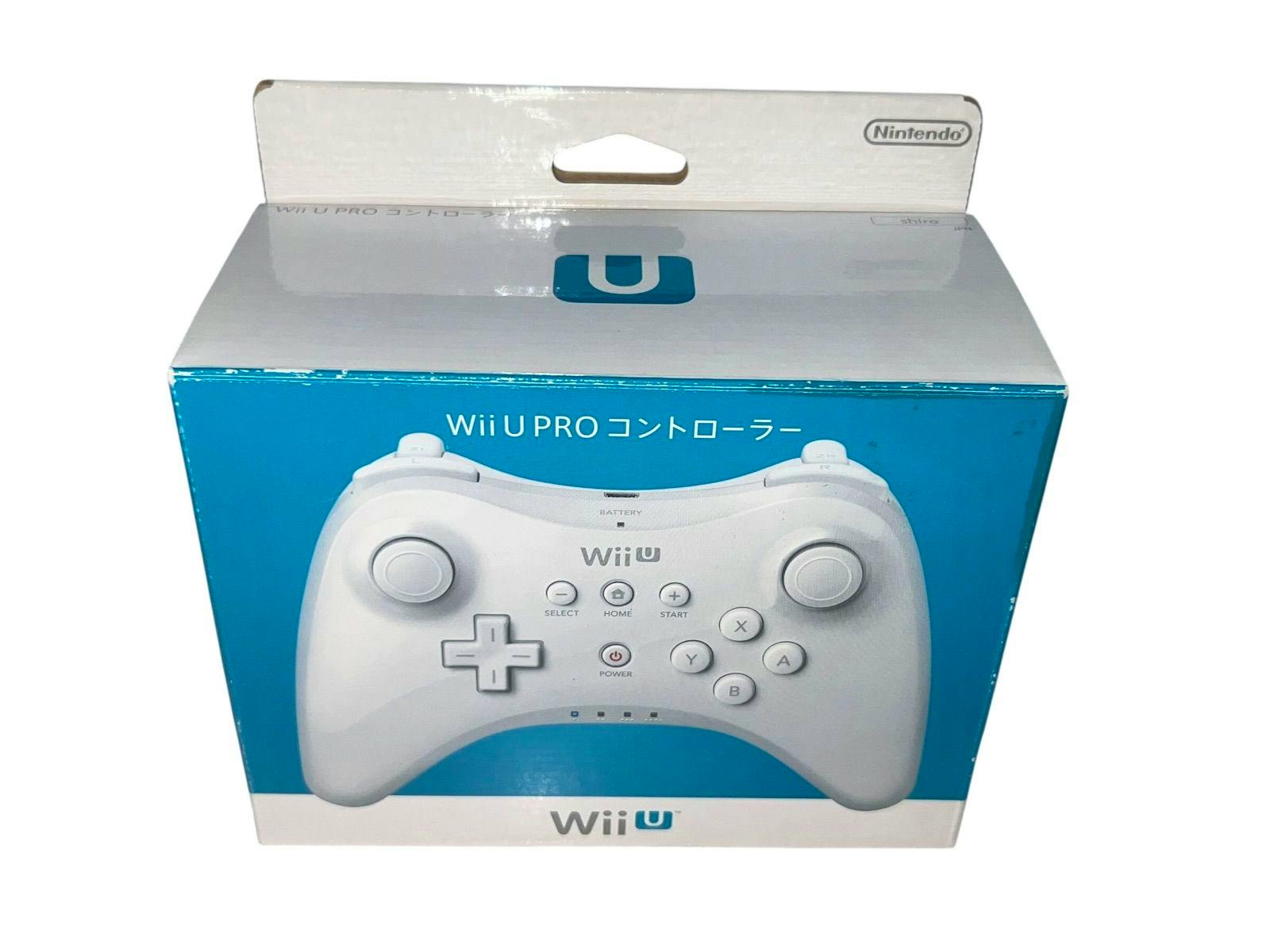 Boxed white Wii U Pro Controller shown in its retail packaging with the controller image on the box.