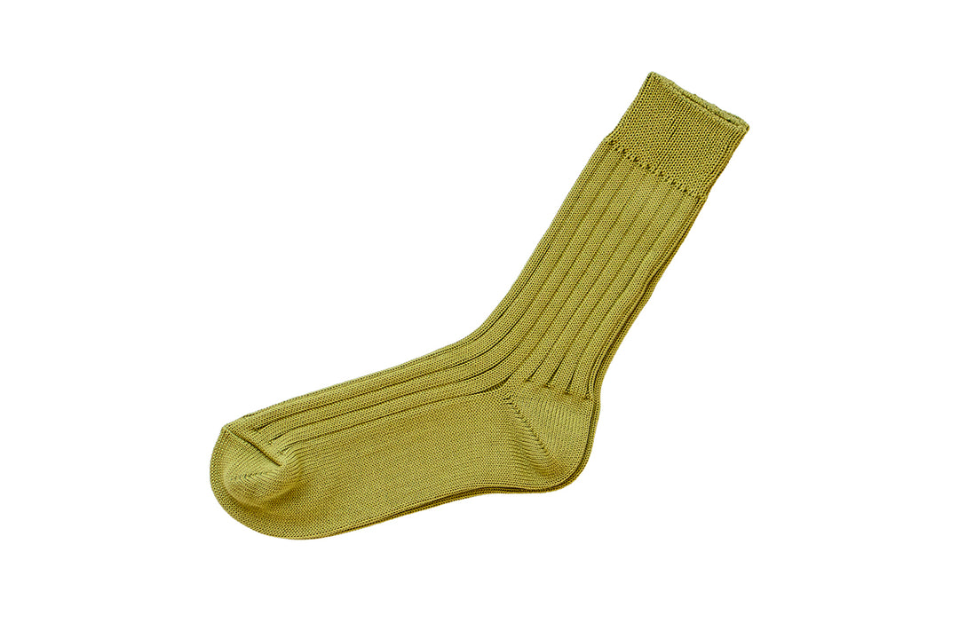 A ribbed men's cotton sock laid flat on a white background, shown in a green color.