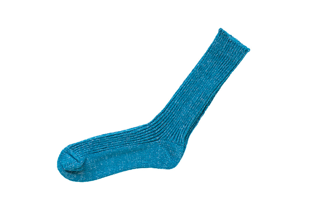 A single hemp cotton ribbed men's sock in turquoise shown on a white background.