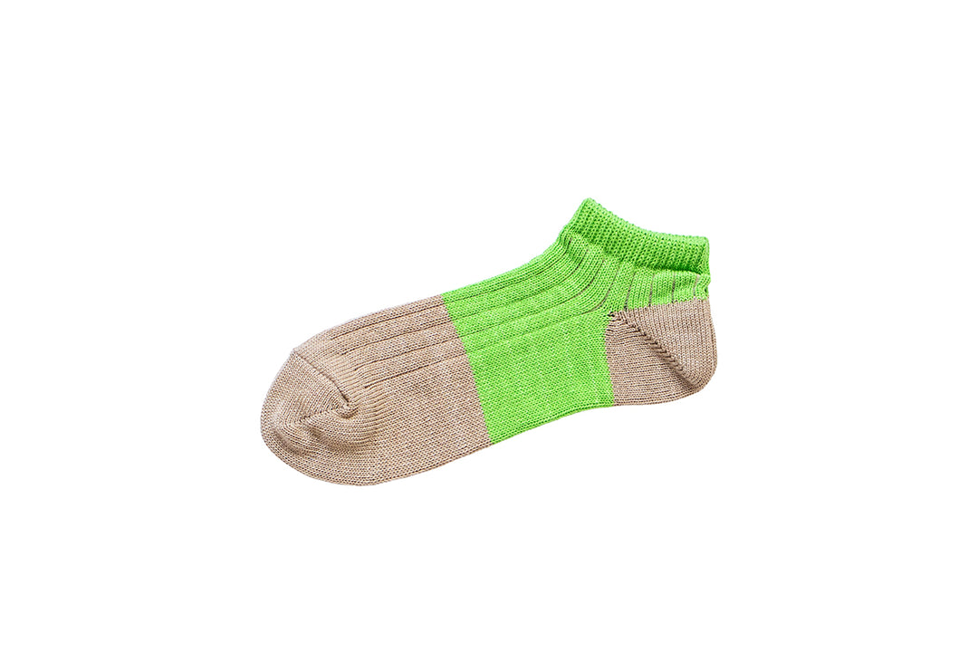 A linen-cotton anklet sock in green and beige shown flat on a white background.