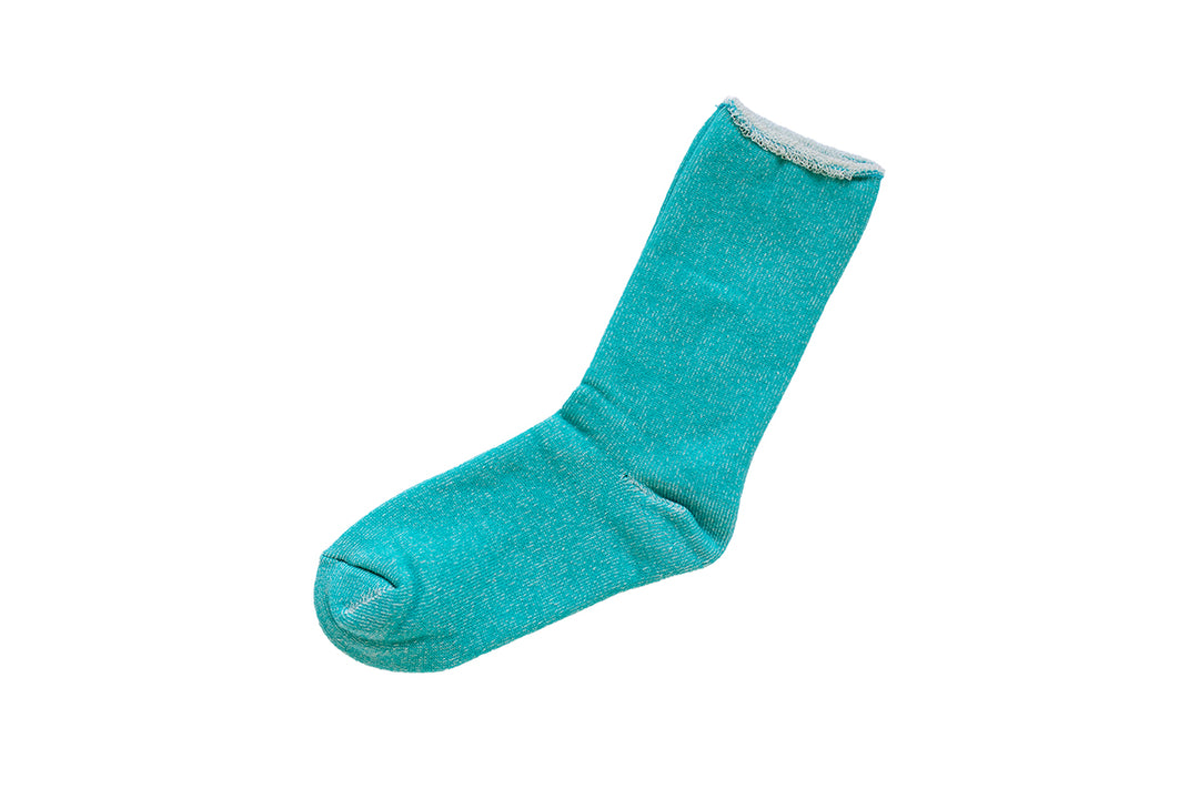 A single turquoise silk cotton lounge sock laid flat on a white background.
