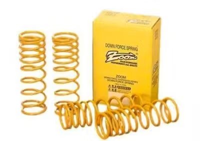 Yellow car lowering springs displayed beside a yellow product box.