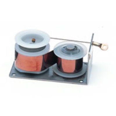 A pair of coiled constant-force springs wound on spool hubs and mounted on a rectangular metal base plate.