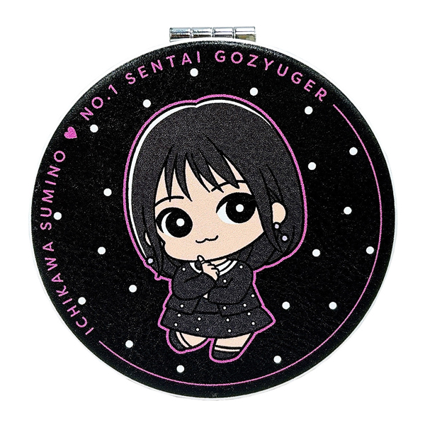 Round compact mirror with a chibi illustration of a girl character on a black polka-dot background.