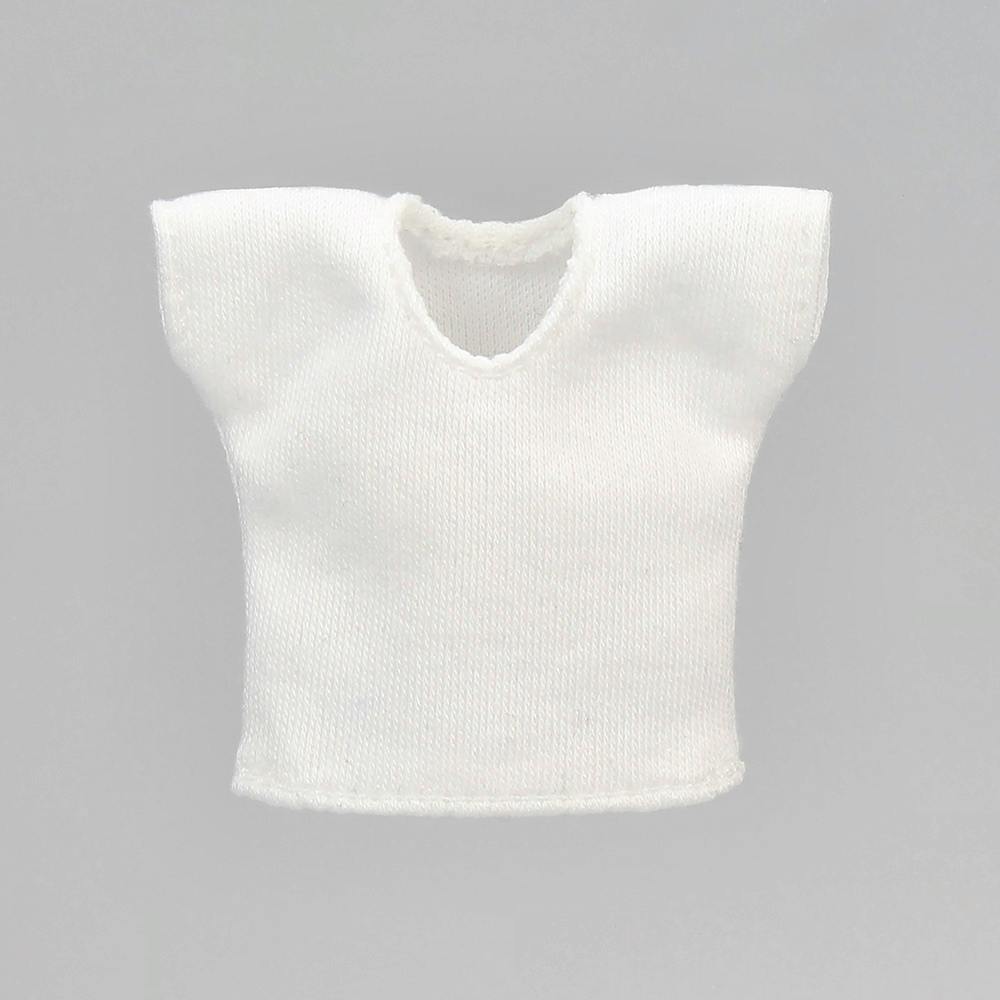Front view of a small white T-shirt for a doll on a plain gray background.