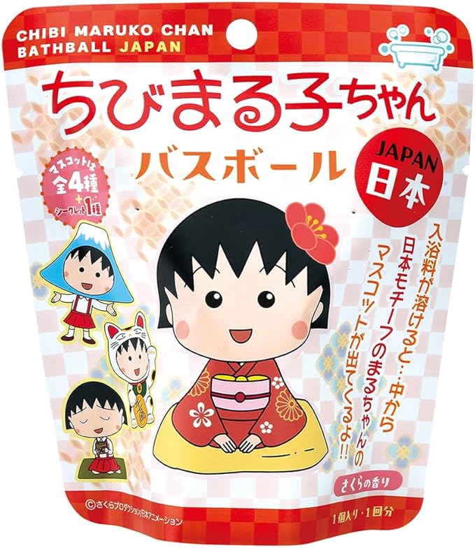 Front photo of the packaged Nol Corporation Chibimaruko-chan bath ball showing Chibi Maruko-chan character artwork and Japanese text on the pouch.