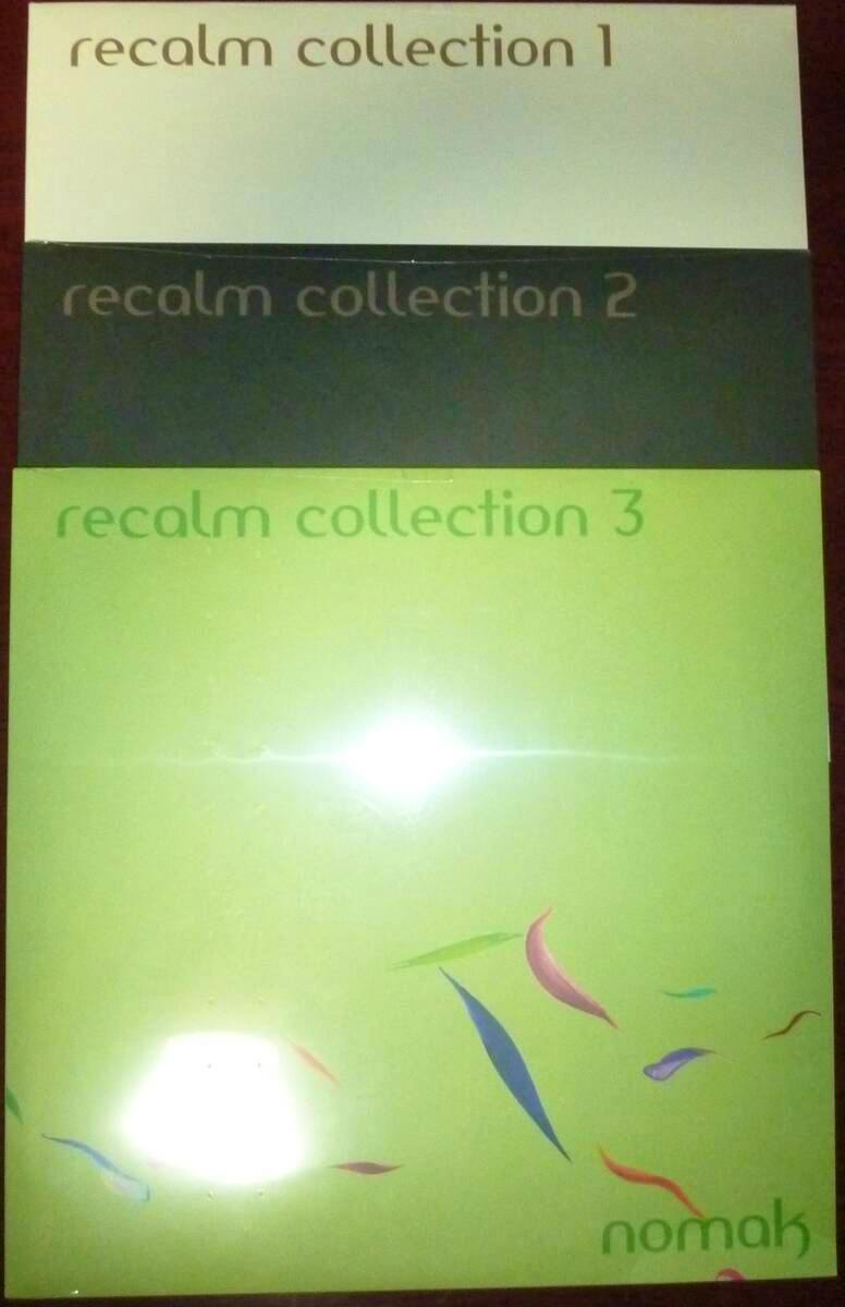 Photo of three vinyl sleeves stacked vertically labeled "recalm collection 1", "recalm collection 2", and "recalm collection 3" with "nomak" at the bottom.