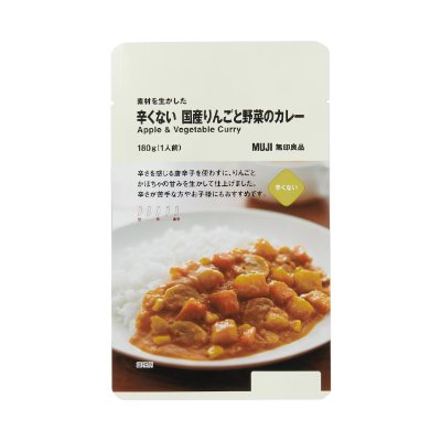 Front view of the pre-packaged plant-based apple and vegetable curry pouch showing the product label and a photo of curry served over rice.