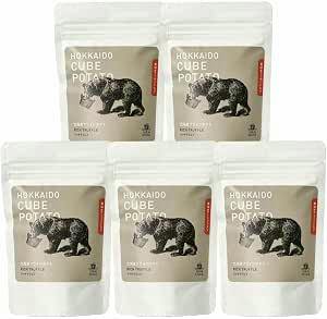 Five white pouches of Hokkaido Cube Potatoes Rich Truffle snack showing the front packaging with bear illustration.