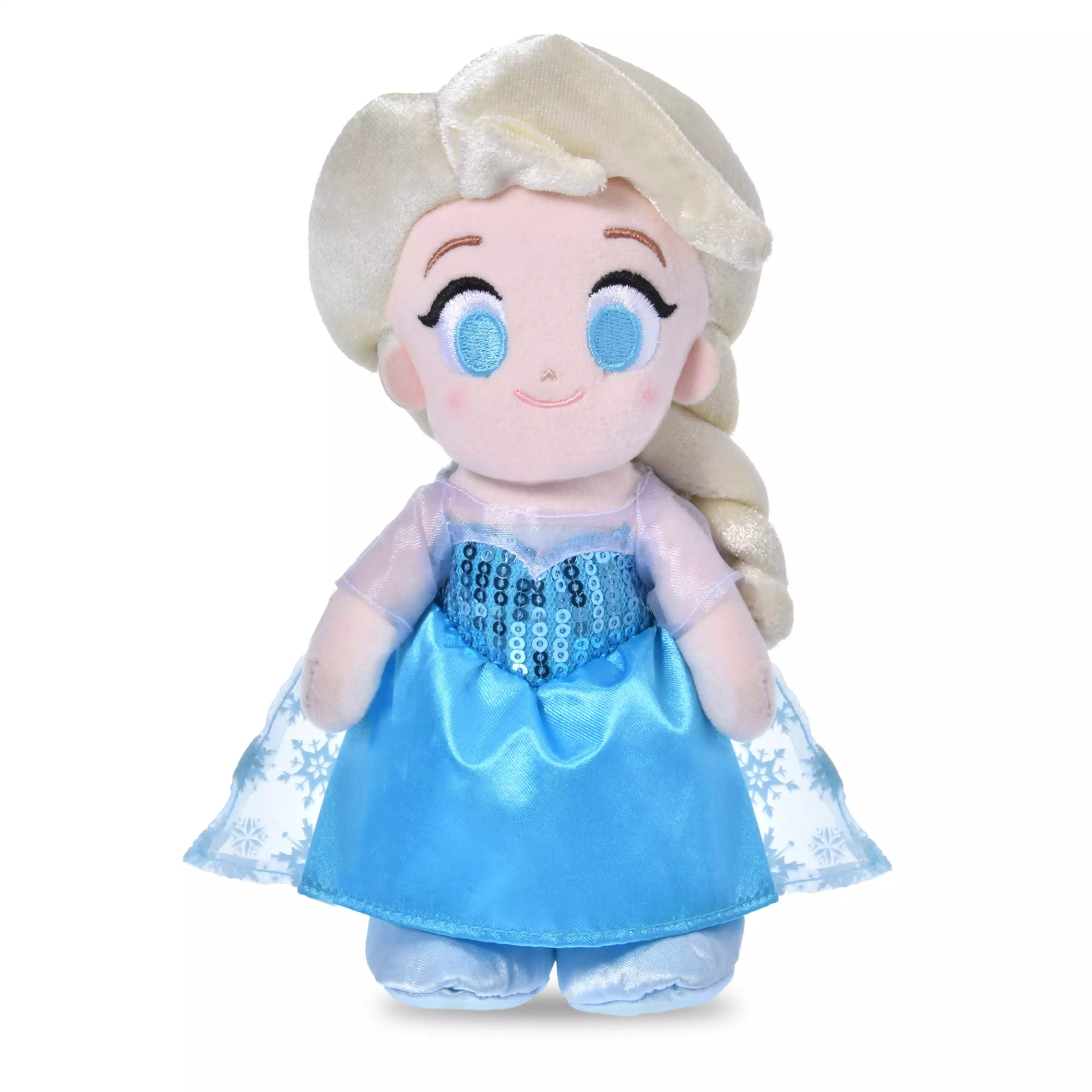 A plush nuiMOs wearing an Elsa-inspired blue dress with sequin bodice, sheer snowflake cape, and matching shoes.