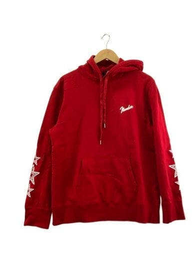 Front view of the red NUMBER (N)INE cotton hoodie showing a chest script logo, kangaroo pocket, and star motifs on the sleeves, hanging on a hanger.