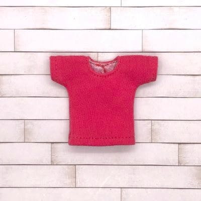 Red short-sleeve round-neck T-shirt for Obitsu11-size doll displayed flat on a wood background.