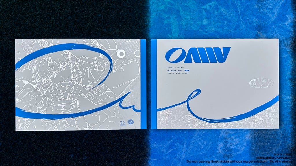 Two copies of the OH MY WORD illustration book showing blue-and-silver cover designs on a blue-black background.