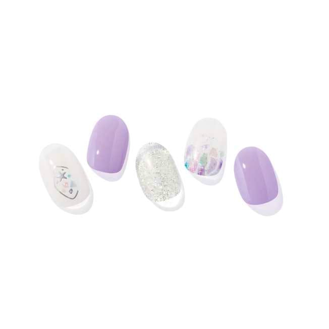 Five press-on nail tips showing lavender, silver glitter, iridescent and clear designs from the ohora Ariel semi-cure gel nail sticker set.