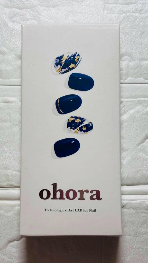 Front of the ohora gel nail sticker box showing blue and patterned nail mockups and the "ohora" logo.