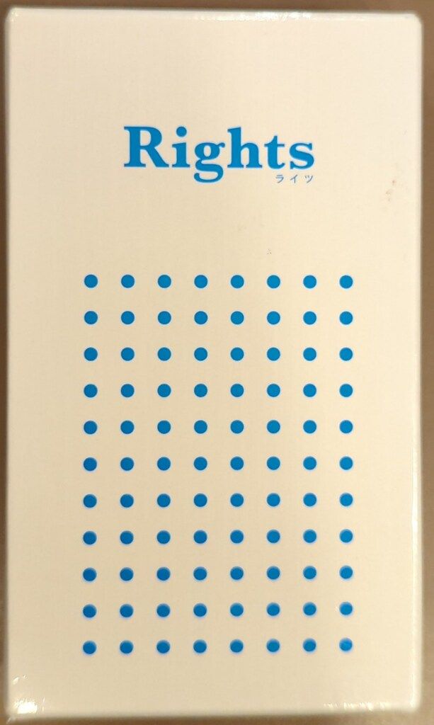 Front of the Rights board game box showing the blue "Rights" title and a grid of blue dots.