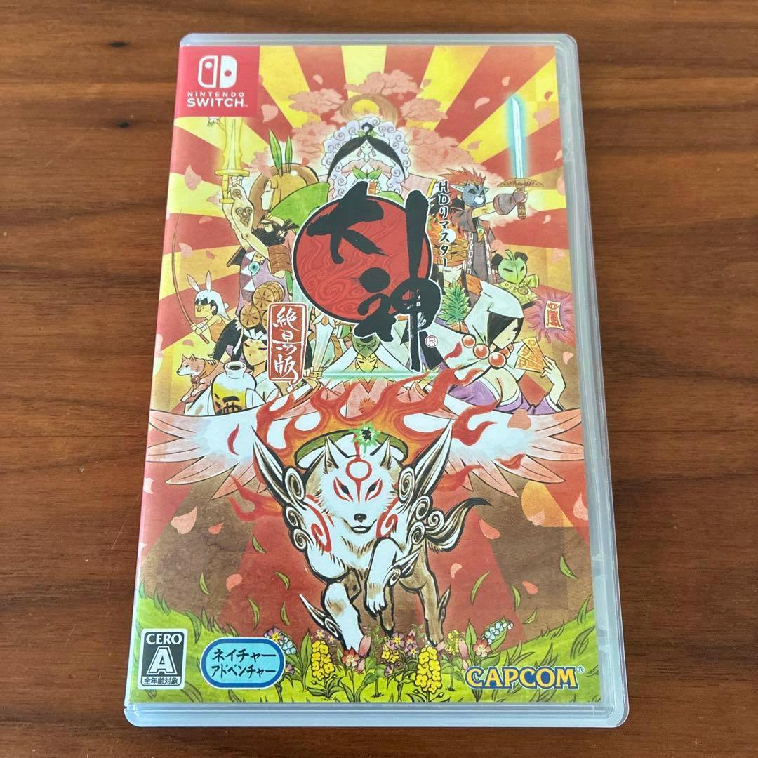 Front cover of the Nintendo Switch game case for 大神 絶景版, showing the illustrated wolf and surrounding characters and artwork.